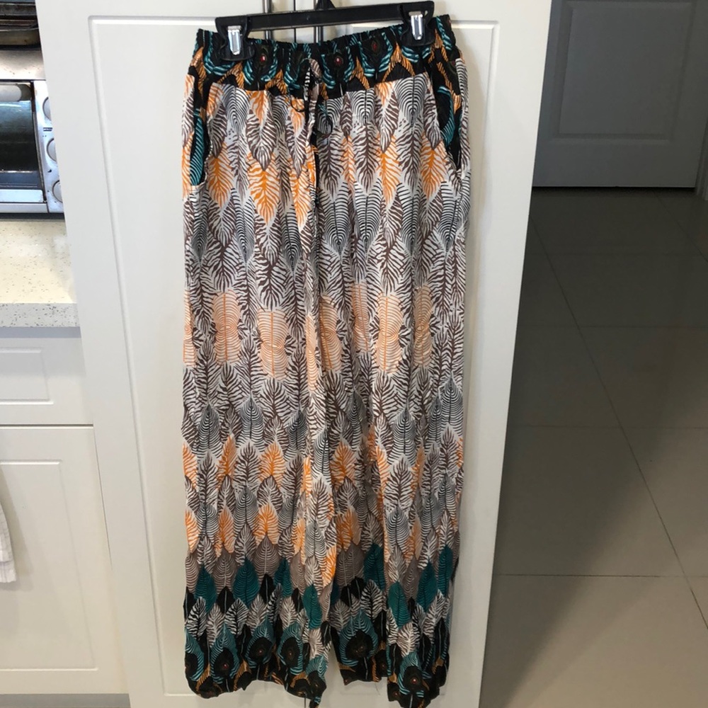Woman’s long stretchy pants; leaf-multicolor, flowy, Size S, stretch waist